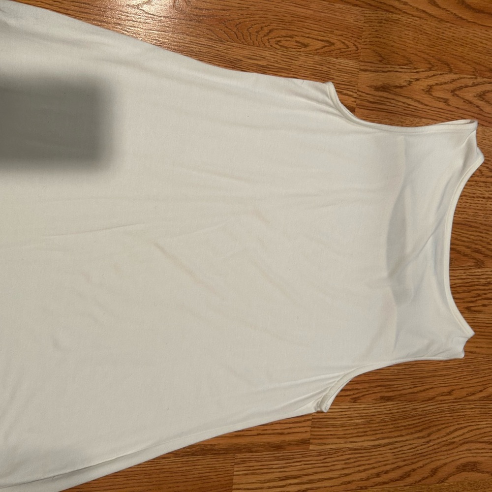 2 Soft Surroundings Sleeveless Tunic with cut out
One black and one white - Picture 7 of 8
